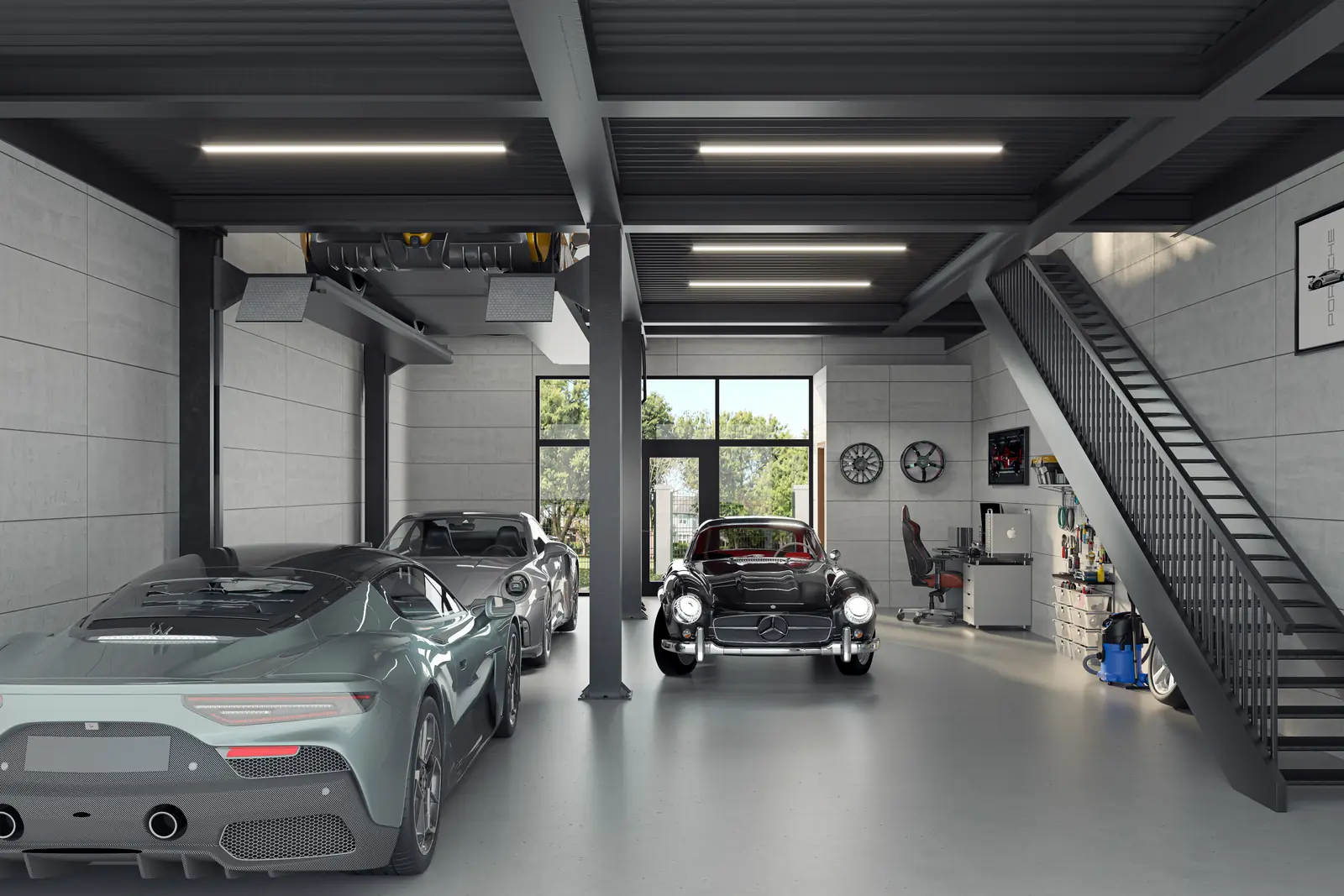 A showroom floor with a collection parked under structural steel, the glass entry door open to the motor court beyond.